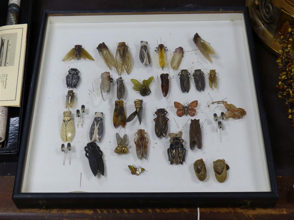 A collection of late 1920s and later cicada, bakelite and bug brooches